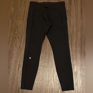Black Lululemon leggings women’s size 12. Zipper pocket